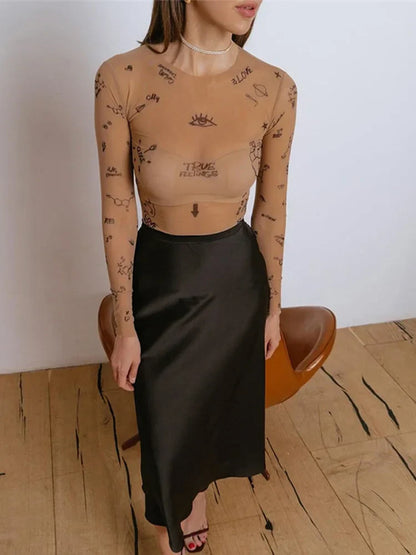 Janella | Body de Malla con Estampado Moderno